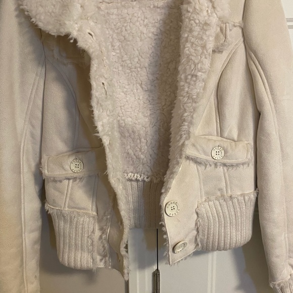 GUESS faux-leather coat features a faux-shearling lining and trim. - Picture 5 of 7